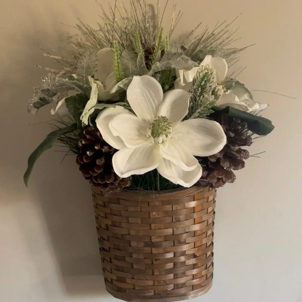 Winter hanging basket floral decor pinecones white flowers pine needles wreath